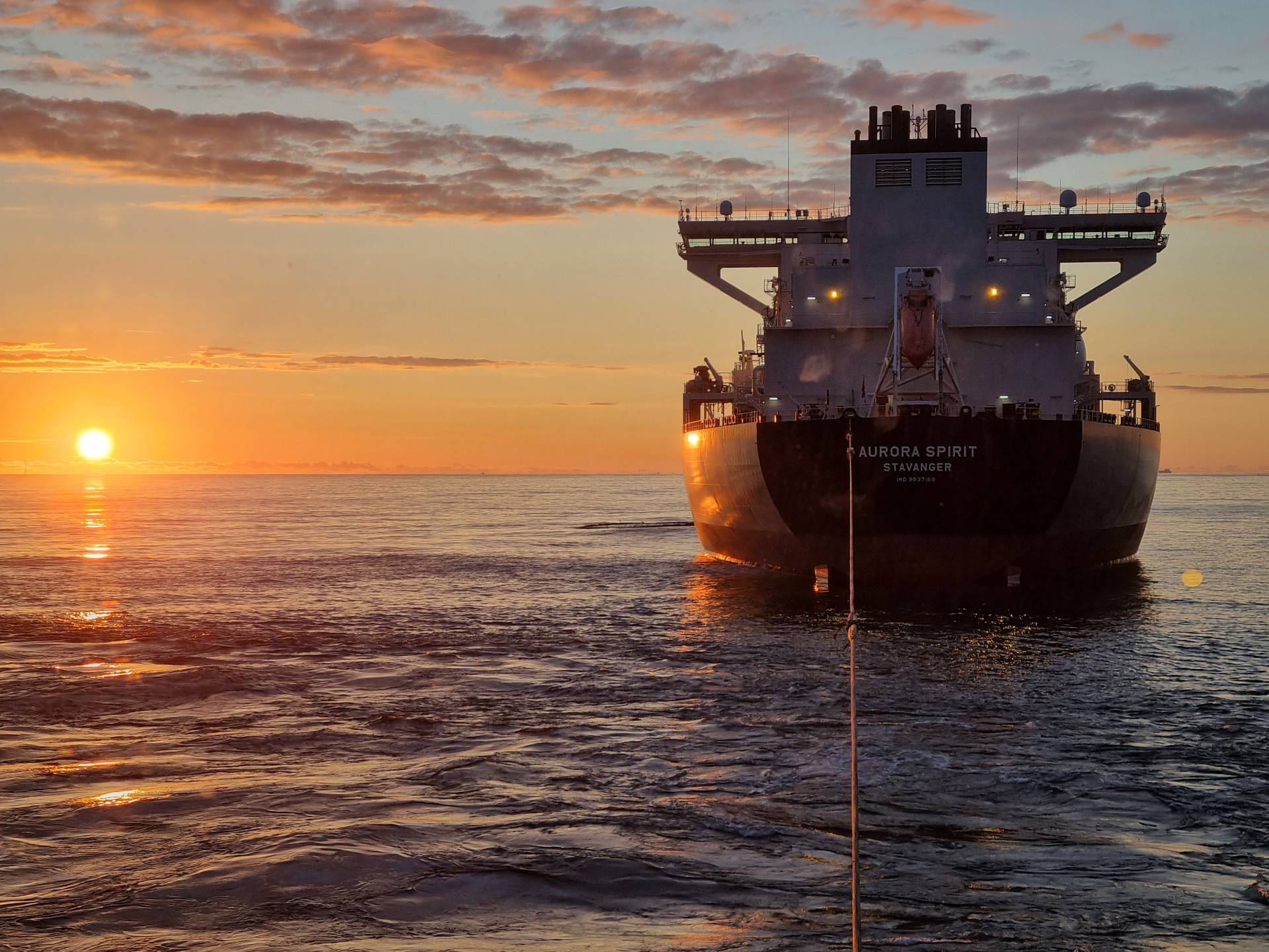 MV Aurora Spirit at sunset on open water